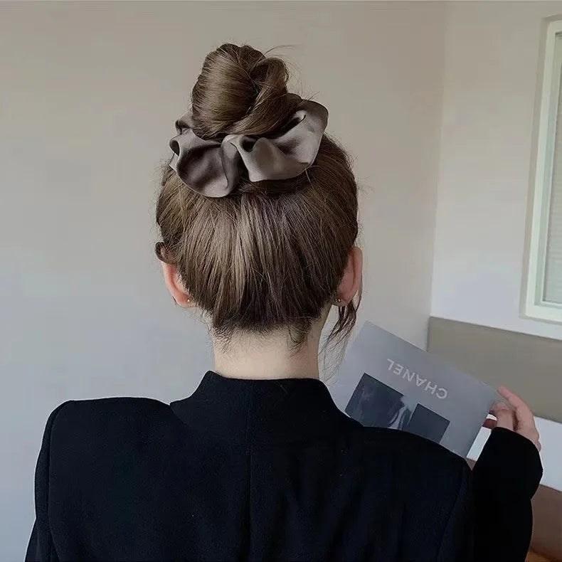 Silk scrunchie worn in hair